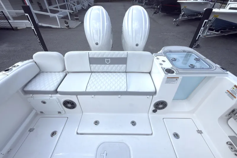 Slide: The Image of 2026 Sea Fox 268 Commander boat interior with seating and storage compartments. - 13