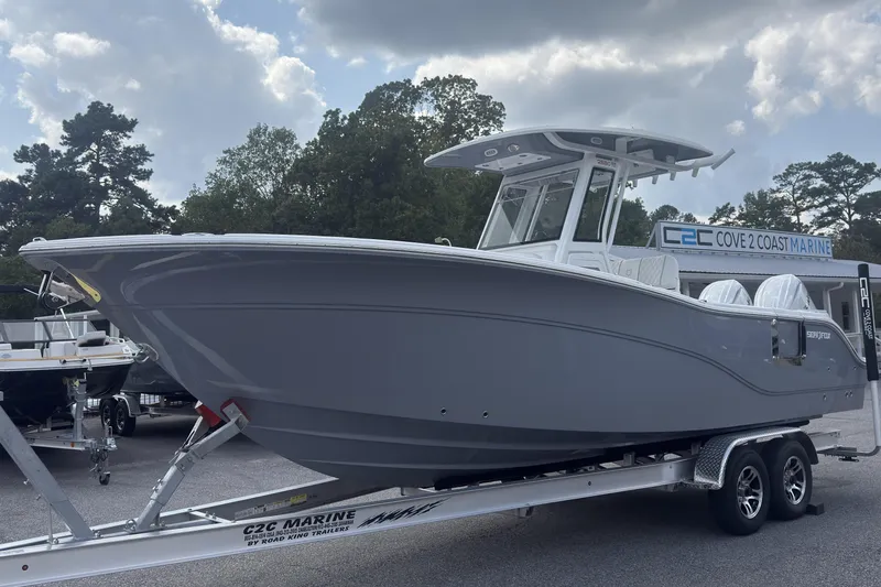 Slide: The Image of 2026 Sea Fox 268 Commander boat on trailer at Cove 2 Coast Marine dealership. - 14