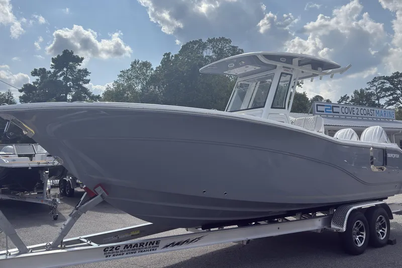 Slide: The Image of 2026 Sea Fox 268 Commander boat on trailer at Cove 2 Coast Marine dealership. - 15