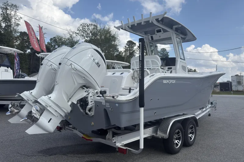 Slide: The Image of 2026 Sea Fox 268 Commander boat with dual Yamaha engines on a trailer. - 3