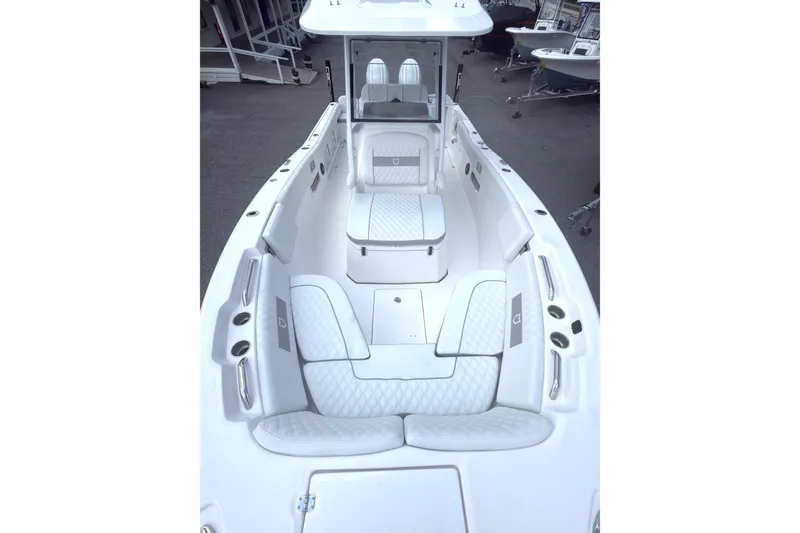 Slide: The Image of 2026 Sea Fox 268 Commander boat interior with white cushioned seating and modern design. - 8