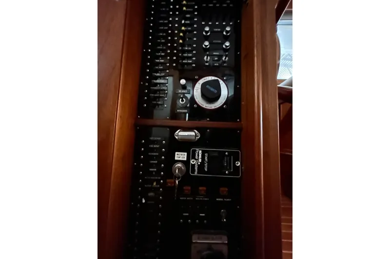 Slide: The Image of Electrical control panel on a 1999 Grand Banks 46 Europa yacht. - 23