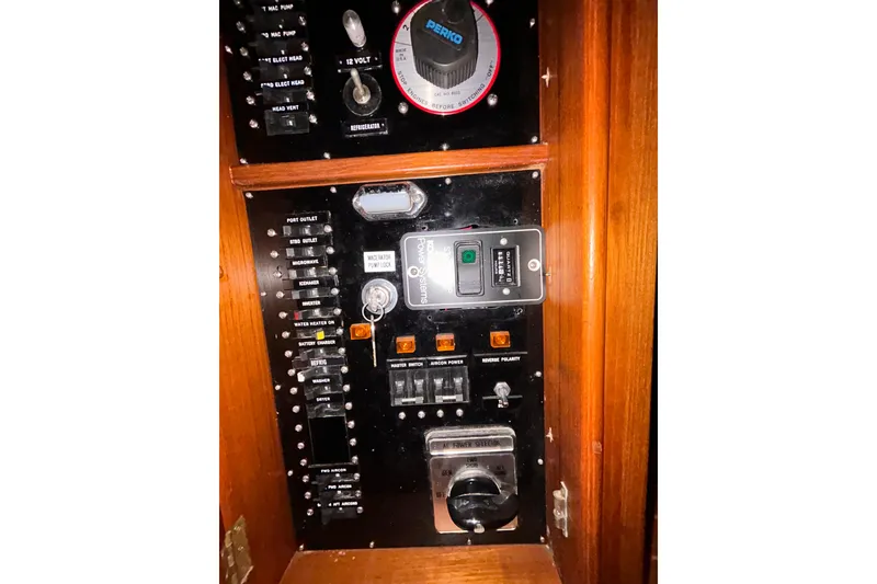 Slide: The Image of Electrical control panel of a 1999 Grand Banks 46 Europa yacht. - 24