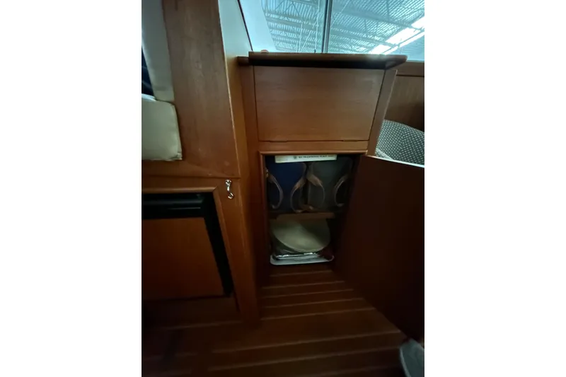 Slide: The Image of Interior storage compartment on a 1999 Grand Banks 46 Europa yacht. - 25