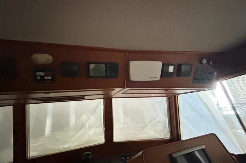 Slide: The Image of Interior dashboard of a 1999 Grand Banks 46 Europa yacht with navigation equipment. - 40