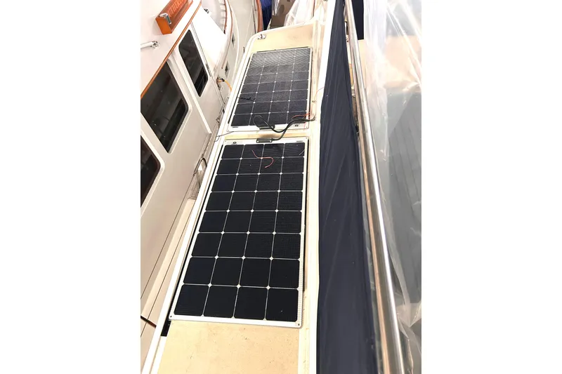 Slide: The Image of Solar panels on 1999 Grand Banks 46 Europa yacht deck for sustainable energy. - 48