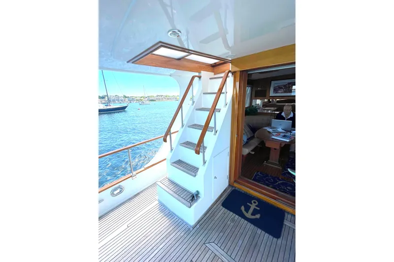 Slide: The Image of Staircase on 1999 Grand Banks 46 Europa yacht with ocean view. - 8
