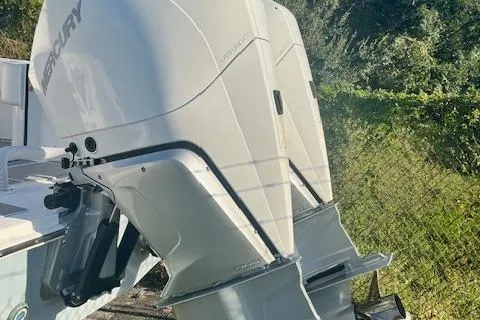 Slide: The Image of 2022 SeaHunter 31 Tournament boat with Mercury outboard engine, side view. - 10