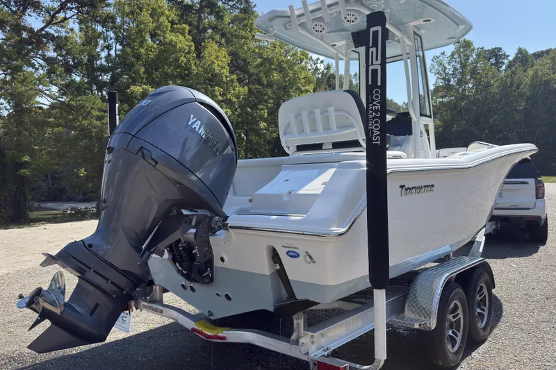 Slide: The Image of 2026 Tidewater 220 LXF boat on trailer with Yamaha outboard motor. - 13