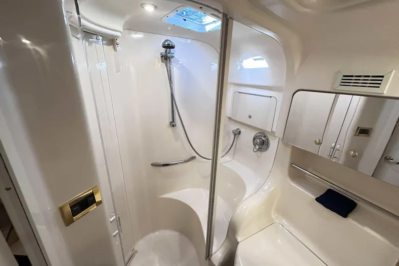 Slide: The Image of Luxurious bathroom in 2000 Sea Ray 410 Sundancer yacht with shower and sleek design. - 36