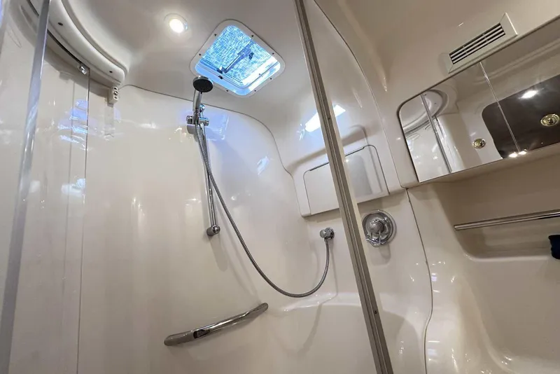 Slide: The Image of Luxurious bathroom in 2000 Sea Ray 410 Sundancer yacht with modern shower amenities. - 37