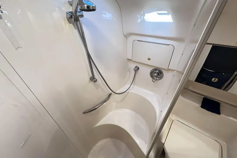 Slide: The Image of Bathroom interior of 2000 Sea Ray 410 Sundancer yacht with shower and fixtures. - 38