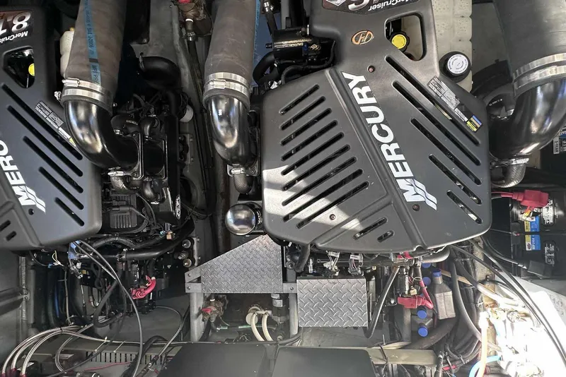 Slide: The Image of Engine compartment of a 2000 Sea Ray 410 Sundancer with Mercury engines. - 45