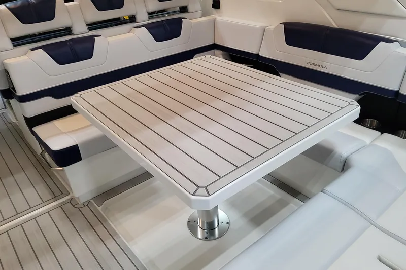 Slide: The Image of 2026 Formula 400 Super Sport Crossover interior with sleek seating and modern table design. - 100