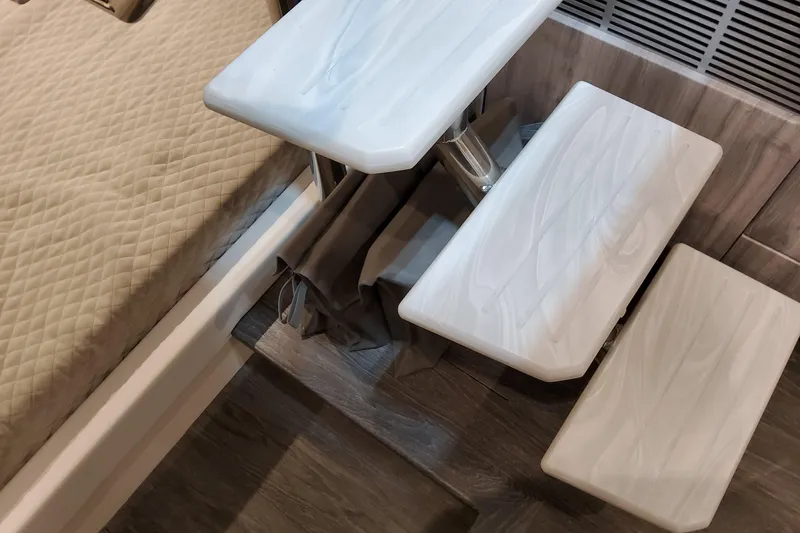 Slide: The Image of Interior of 2026 Formula 400 Super Sport Crossover with modern seating and wooden flooring. - 109