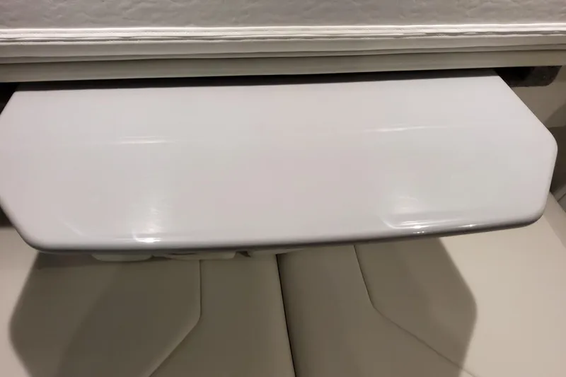 Slide: The Image of 2026 Formula 400 Super Sport Crossover interior table detail, white surface. - 120