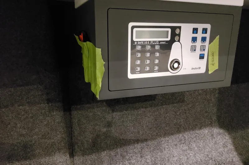 Slide: The Image of Digital safe installed in a 2026 Formula 400 Super Sport Crossover boat interior. - 122