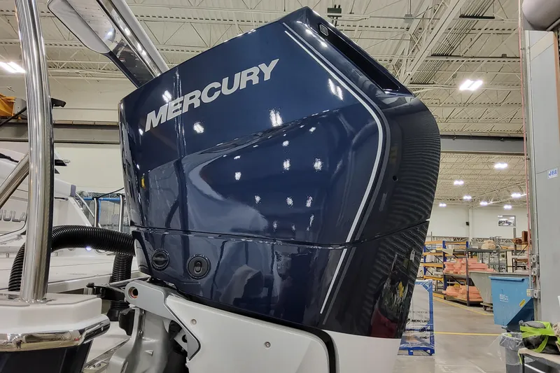 Slide: The Image of 2026 Formula 400 Super Sport Crossover with Mercury engine in a workshop setting. - 13