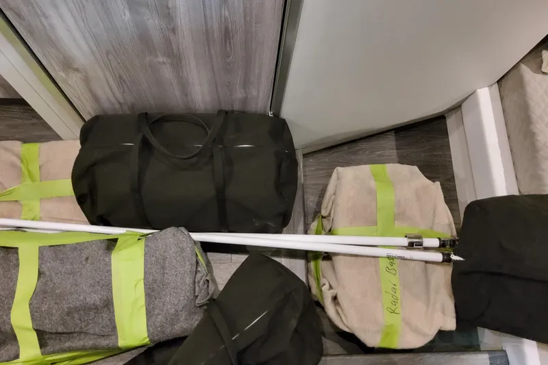 Slide: The Image of Bags and equipment stored in a Formula 400 Super Sport Crossover, 2026 model. - 135