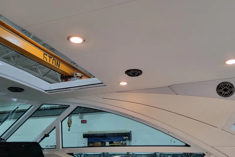 Slide: The Image of Interior view of 2026 Formula 400 Super Sport Crossover boat with modern lighting and design. - 139