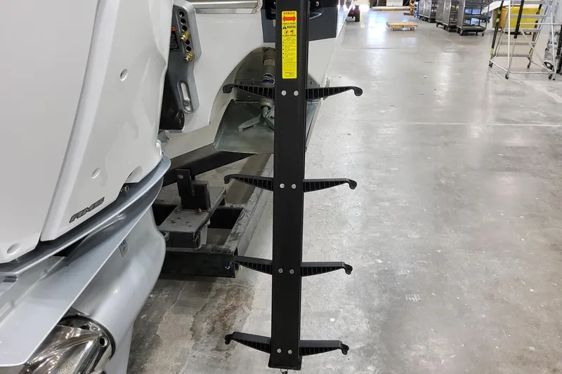 Slide: The Image of 2026 Formula 400 Super Sport Crossover boat ladder in a workshop setting. - 18