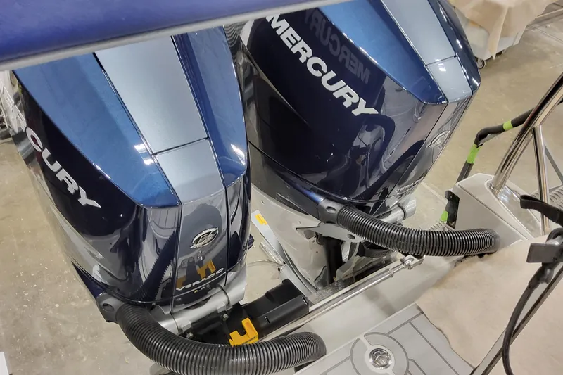 Slide: The Image of 2026 Formula 400 Super Sport Crossover with dual Mercury outboard engines. - 21