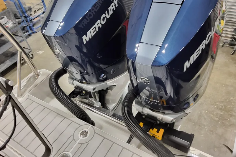 Slide: The Image of Twin Mercury outboard engines on a 2026 Formula 400 Super Sport Crossover boat. - 22