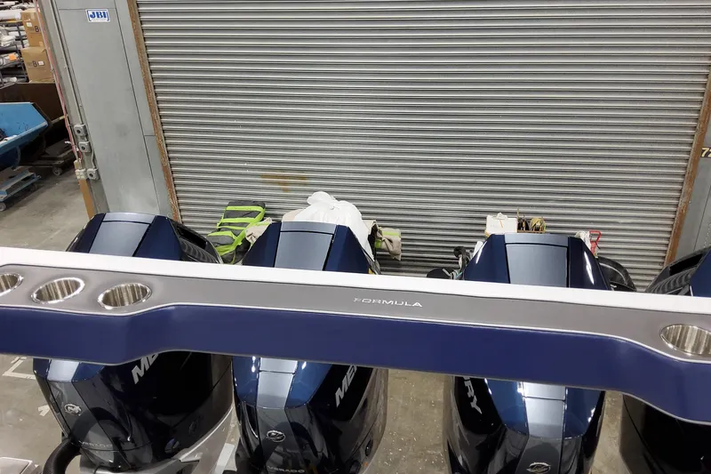 Slide: The Image of 2026 Formula 400 Super Sport Crossover engines in a workshop setting. - 26