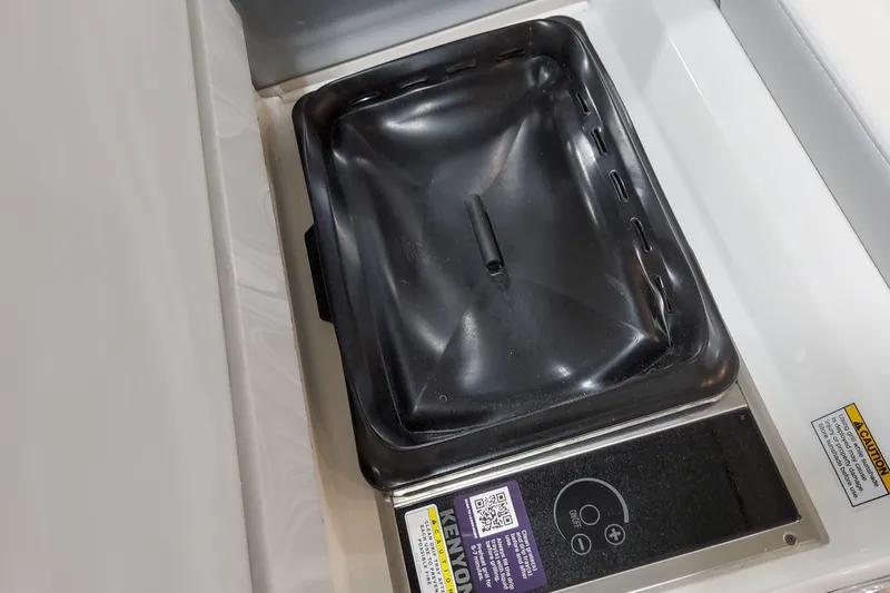 Slide: The Image of Built-in grill on 2026 Formula 400 Super Sport Crossover boat, featuring sleek design and controls. - 35