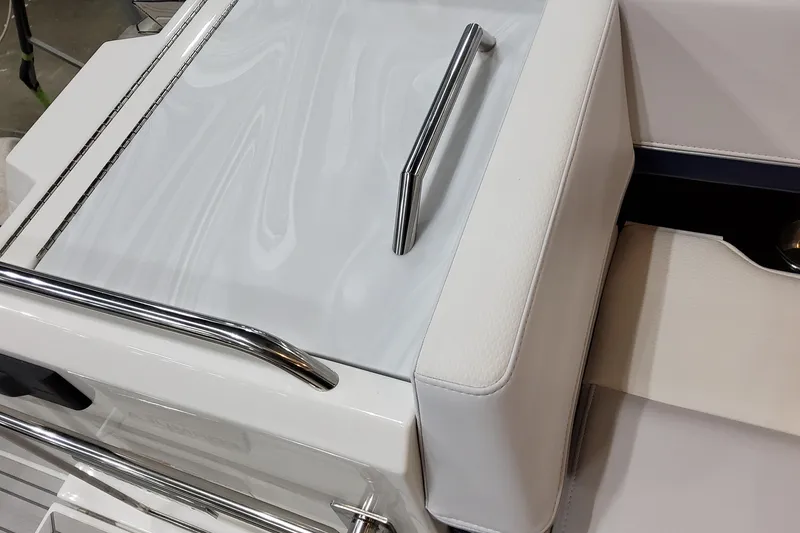 Slide: The Image of 2026 Formula 400 Super Sport Crossover boat interior with sleek white seating and chrome accents. - 36