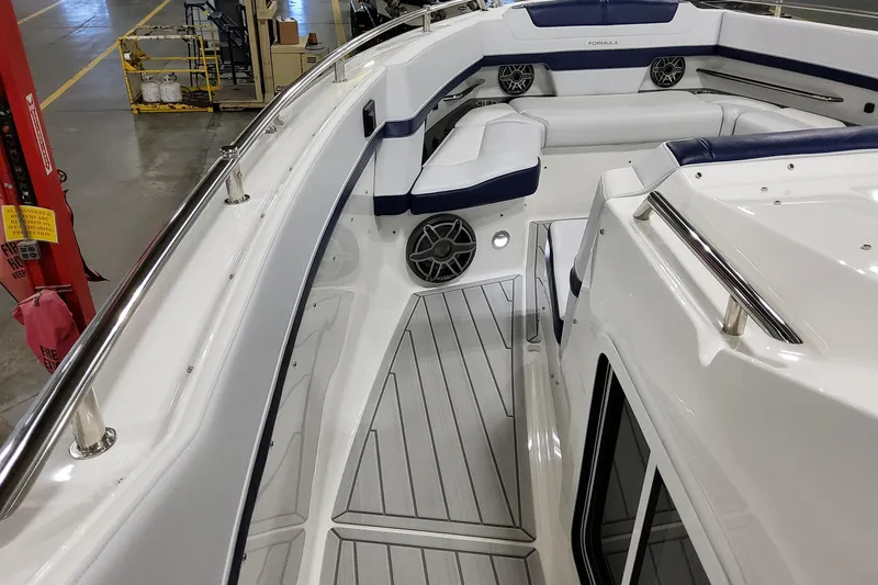 Slide: The Image of 2026 Formula 400 Super Sport Crossover boat interior with sleek seating and modern design. - 37