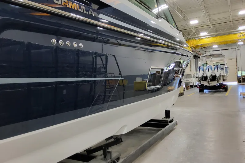 Slide: The Image of 2026 Formula 400 Super Sport Crossover in a spacious indoor facility. - 4