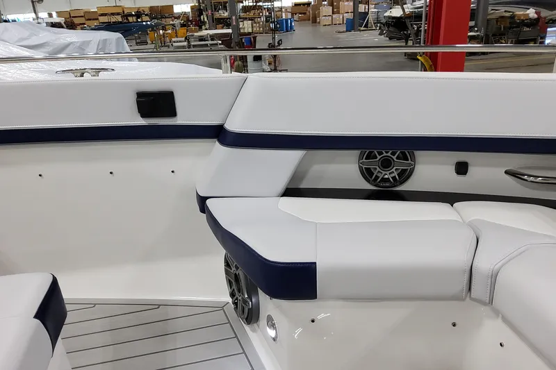 Slide: The Image of 2026 Formula 400 Super Sport Crossover interior with white and navy seating, speaker detail. - 49