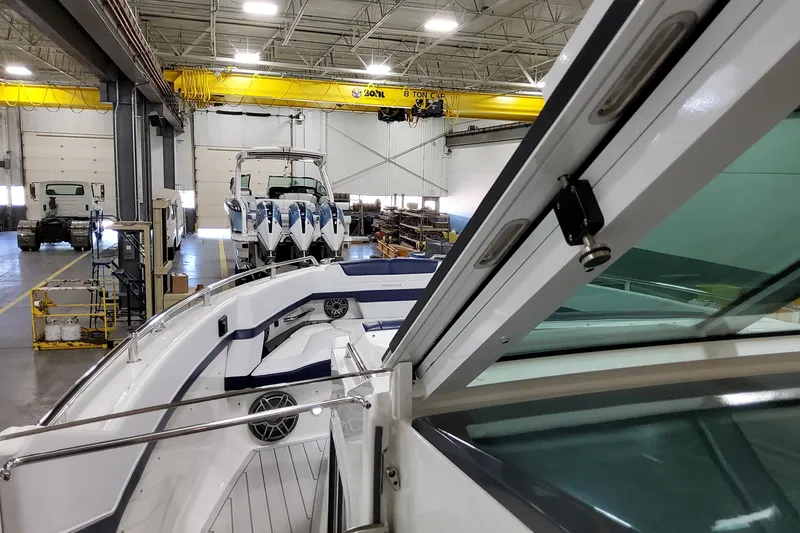 Slide: The Image of 2026 Formula 400 Super Sport Crossover in a spacious indoor facility. - 54