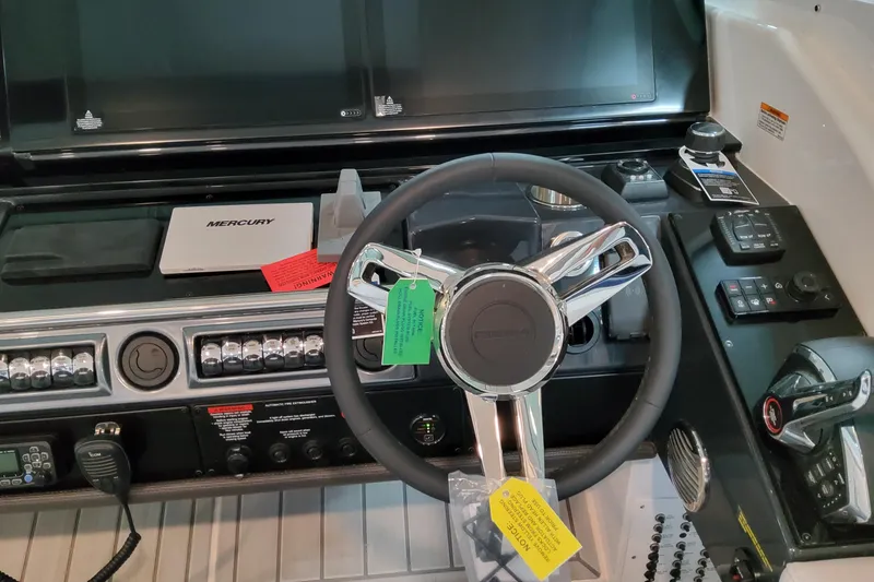 Slide: The Image of 2026 Formula 400 Super Sport Crossover helm with advanced controls and Mercury system. - 61