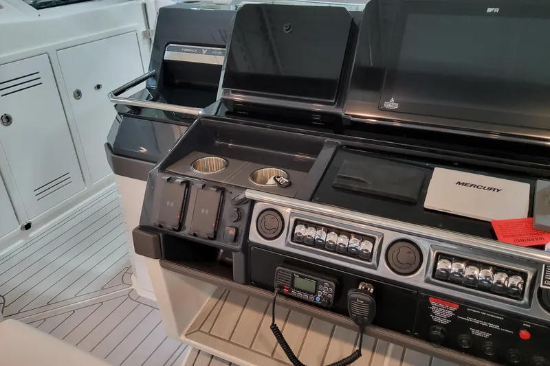 Slide: The Image of 2026 Formula 400 Super Sport Crossover helm with advanced controls and navigation systems. - 63