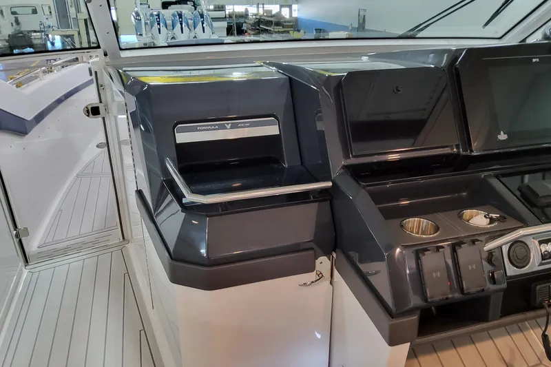 Slide: The Image of 2026 Formula 400 Super Sport Crossover helm with modern controls and sleek design. - 64