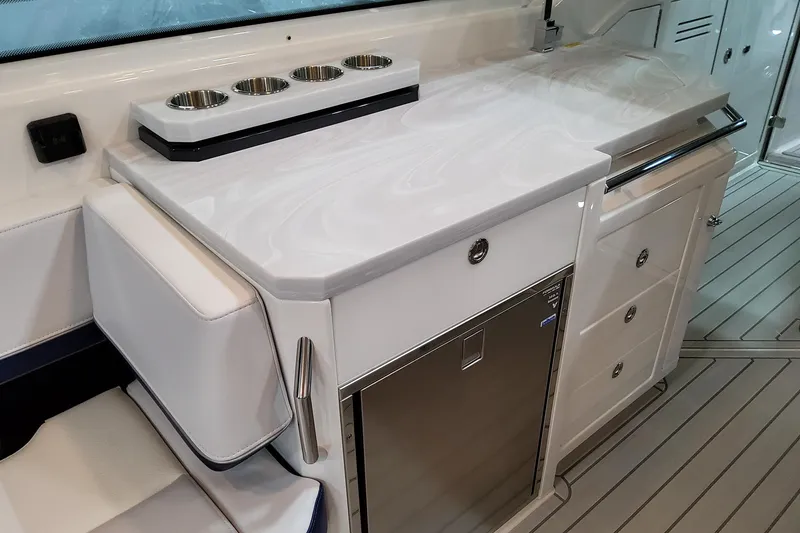 Slide: The Image of 2026 Formula 400 Super Sport Crossover yacht interior with sleek countertop and storage. - 71