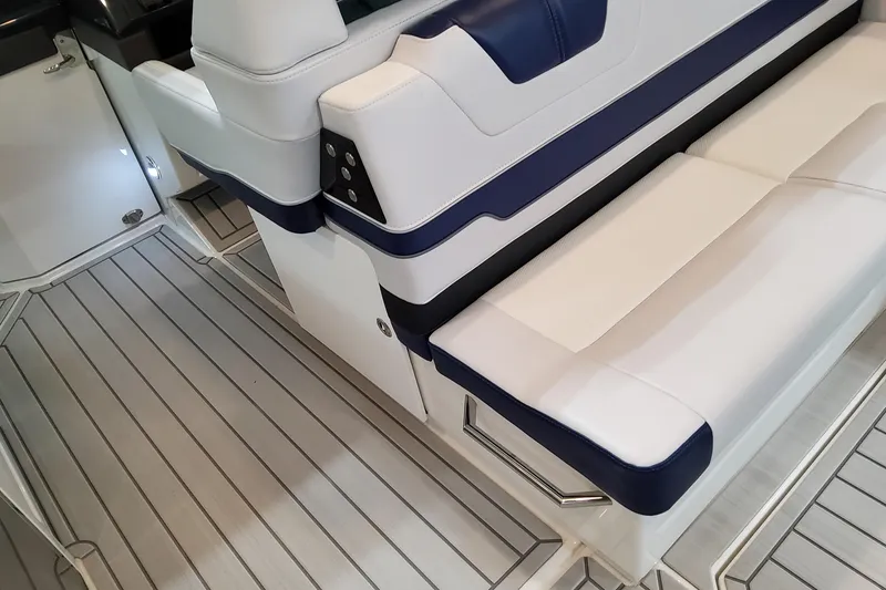 Slide: The Image of 2026 Formula 400 Super Sport Crossover interior with white and blue seating, sleek design. - 81