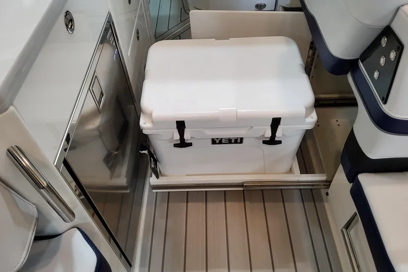 Slide: The Image of YETI cooler in 2026 Formula 400 Super Sport Crossover boat interior. - 82