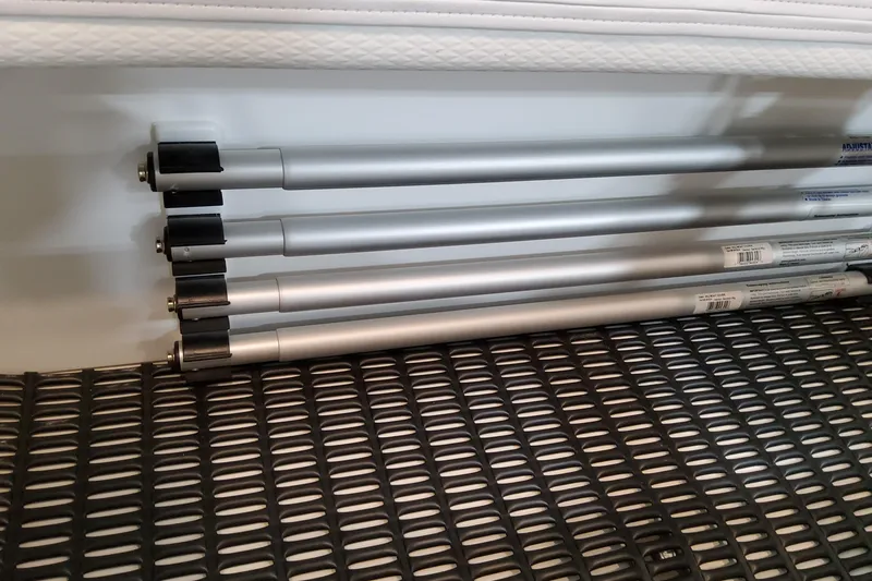 Slide: The Image of Silver poles stored on a Formula 400 Super Sport Crossover, 2026 model. - 83