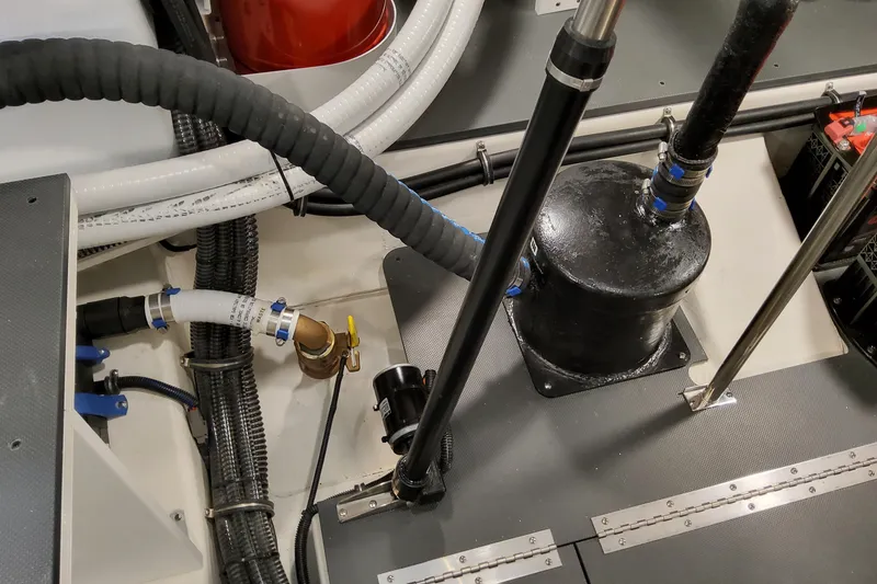 Slide: The Image of Engine compartment of 2026 Formula 400 Super Sport Crossover with hoses and components. - 92