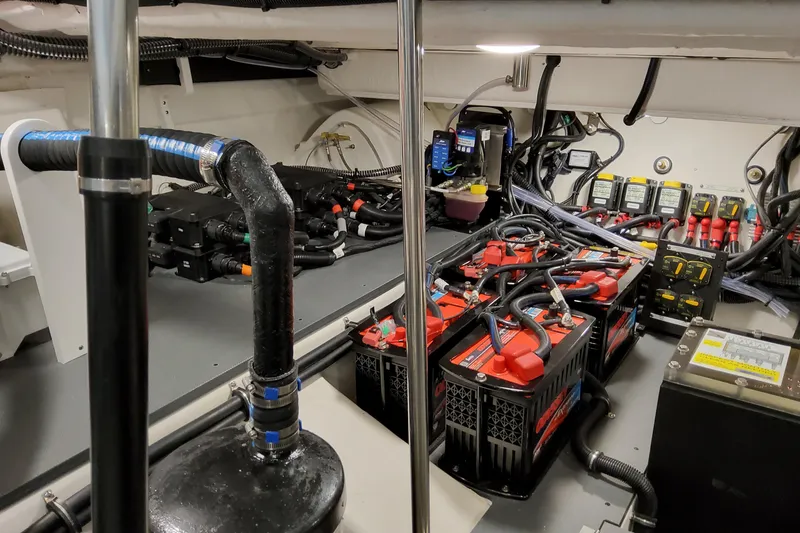 Slide: The Image of Engine room of 2026 Formula 400 Super Sport Crossover with batteries and wiring. - 94