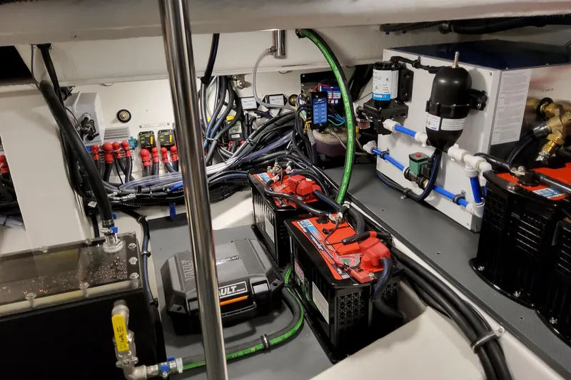 Slide: The Image of Engine room of 2026 Formula 400 Super Sport Crossover with batteries and wiring. - 96