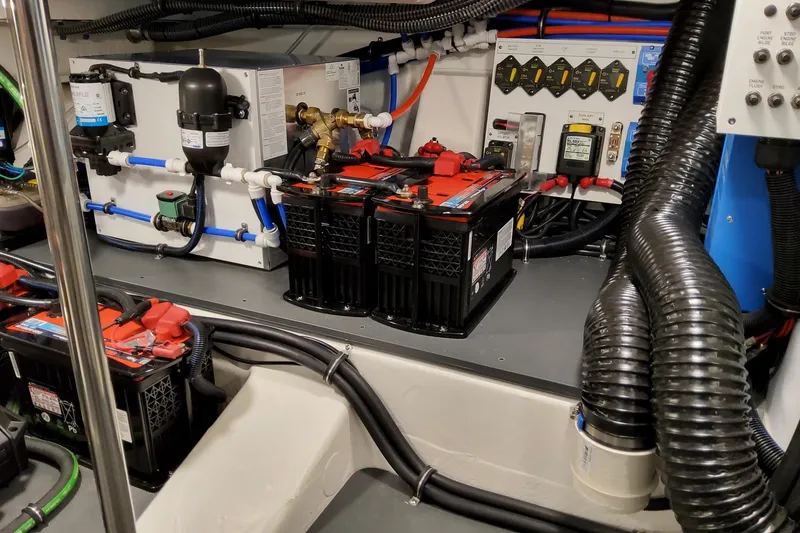 Slide: The Image of Engine room of 2026 Formula 400 Super Sport Crossover with batteries and wiring. - 97
