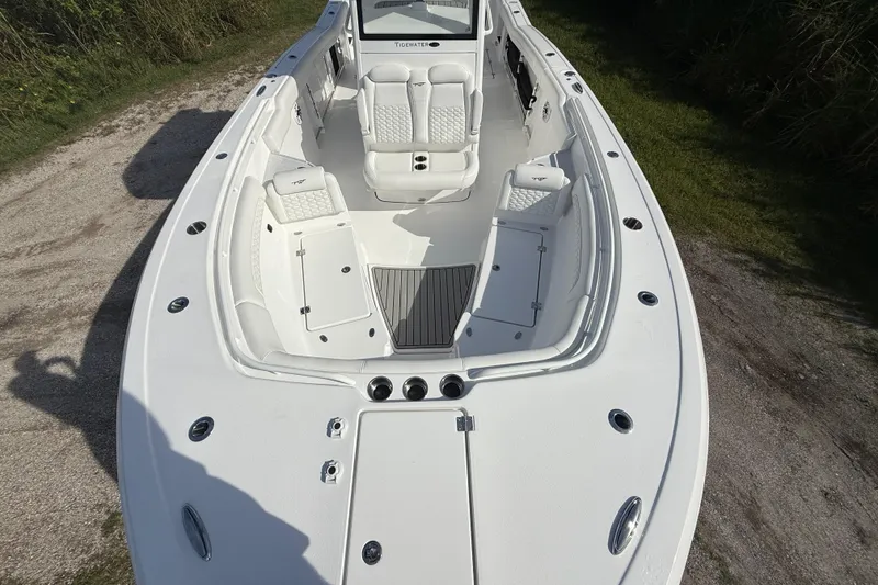 Slide: The Image of 2026 Tidewater 282 CC Adventure boat with spacious seating and sleek design. - 25