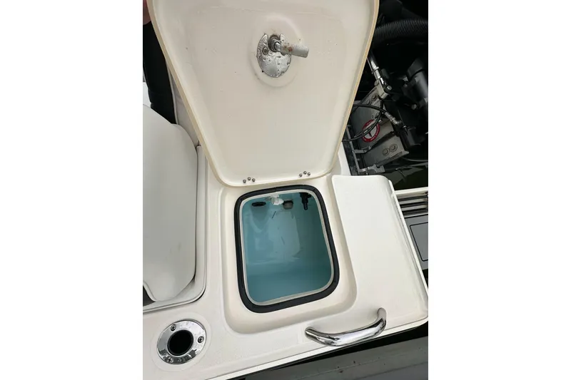 Slide: The Image of Open storage compartment on 2021 ShearWater 270 Carolina Flare boat. - 30