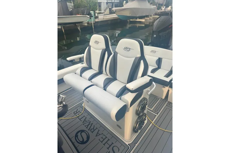 Slide: The Image of 2021 ShearWater 270 Carolina Flare boat interior with stylish seating and modern design. - 4