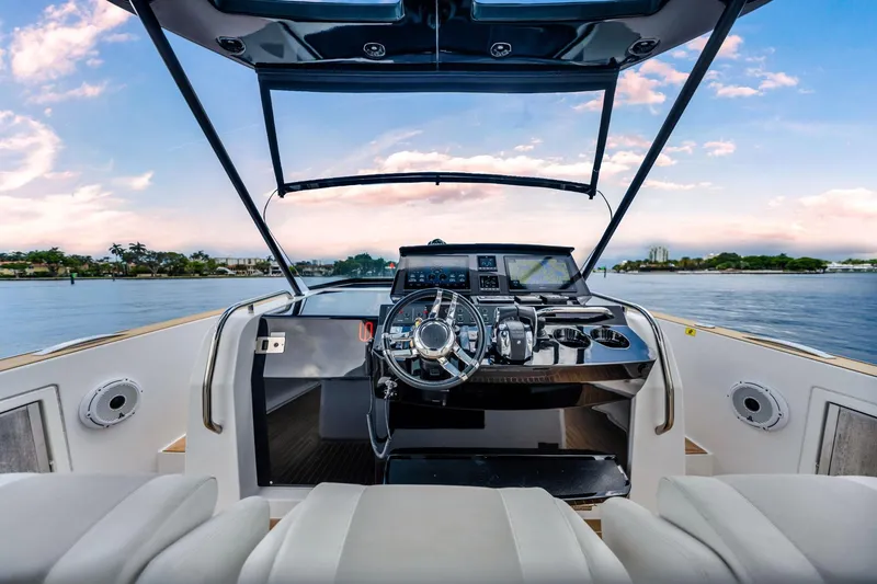 Slide: The Image of Helm of 2021 Pardo Yachts 38 with scenic water view. - 20