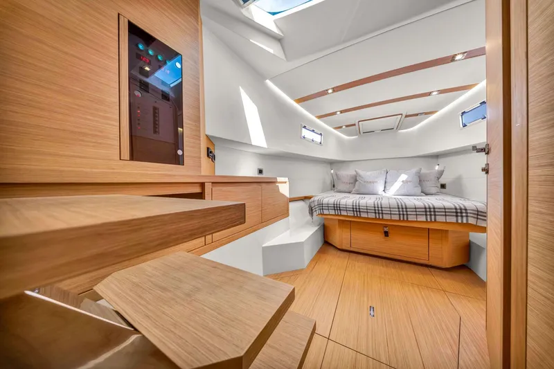 Slide: The Image of Luxurious interior of 2021 Pardo Yachts 38, featuring a cozy cabin with modern wood finishes. - 29